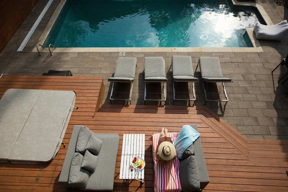 aerial view of pool and deck